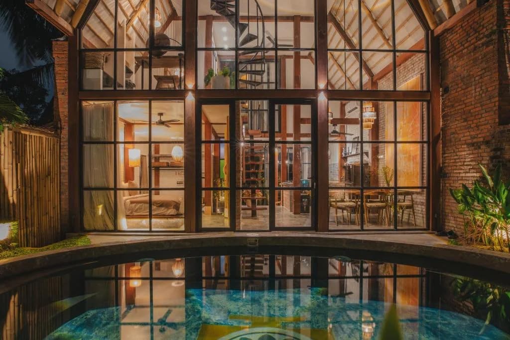 Luxury villa interior with minimalist design and natural materials at Sanctuary Villas Ubud